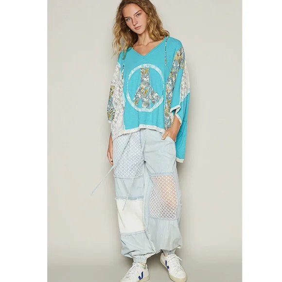 75. NWOT POL Turquoise Oversized V-neck Floral Peace Sign Hoodie - Picture 4 of 7